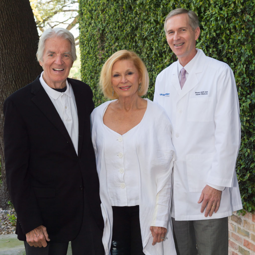 couple with doctor in white coat