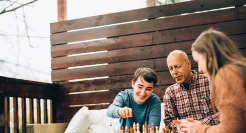 Family playing chess