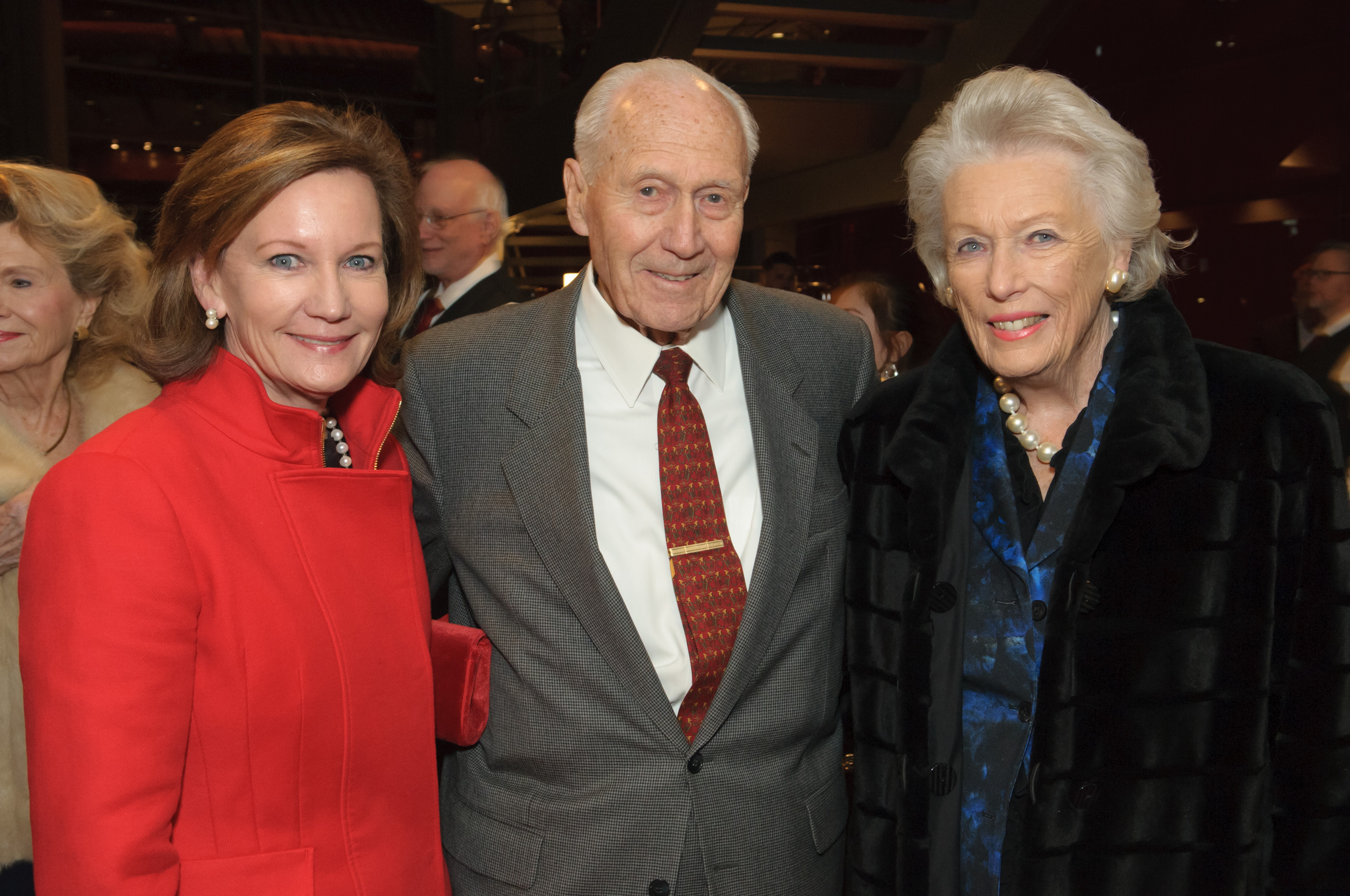 Three people together at an event