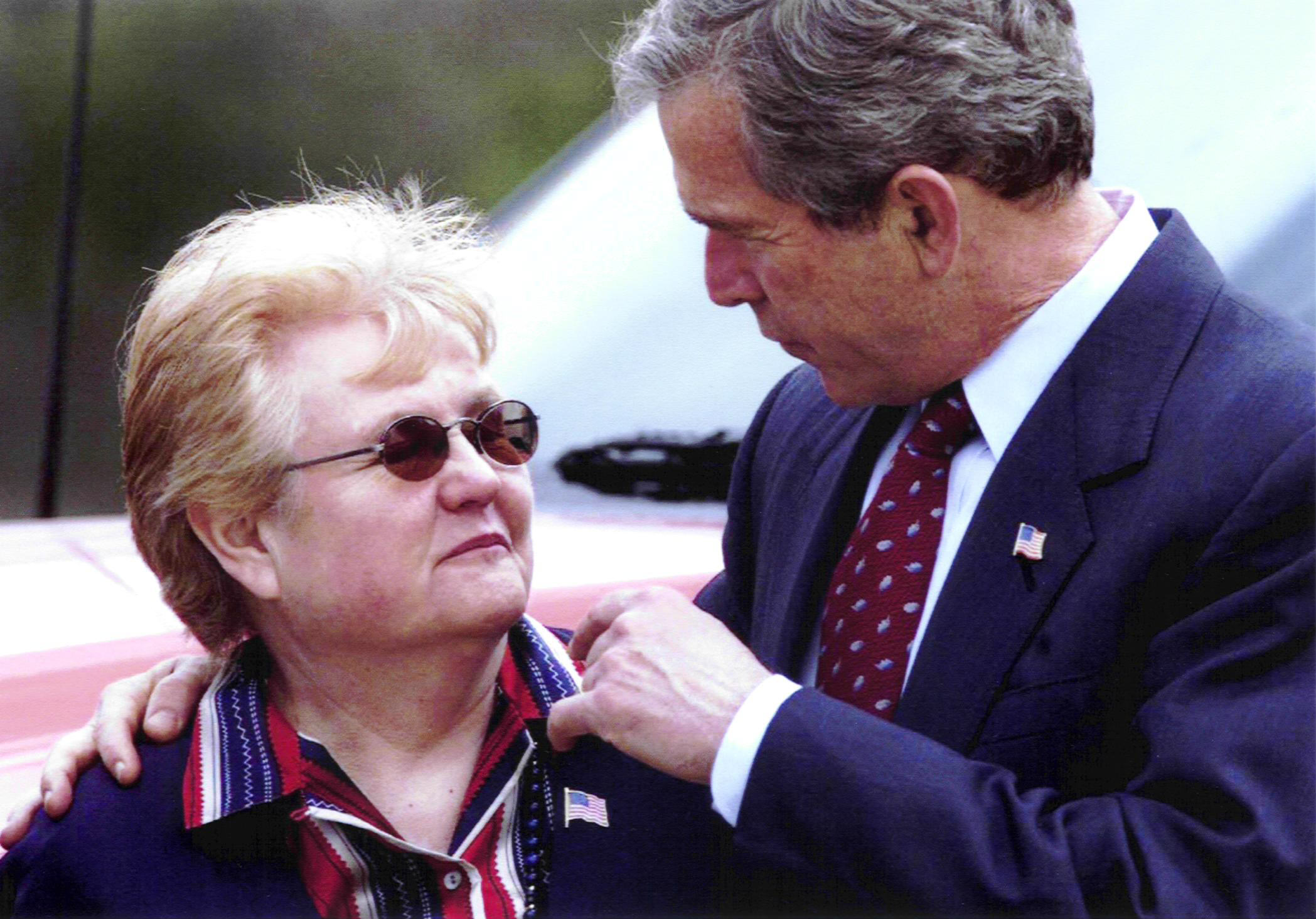 Ellen Heck honored by President George W. Bush for the incredible acts she and her team made on September 11th to become heroes of 9/11 forever.
