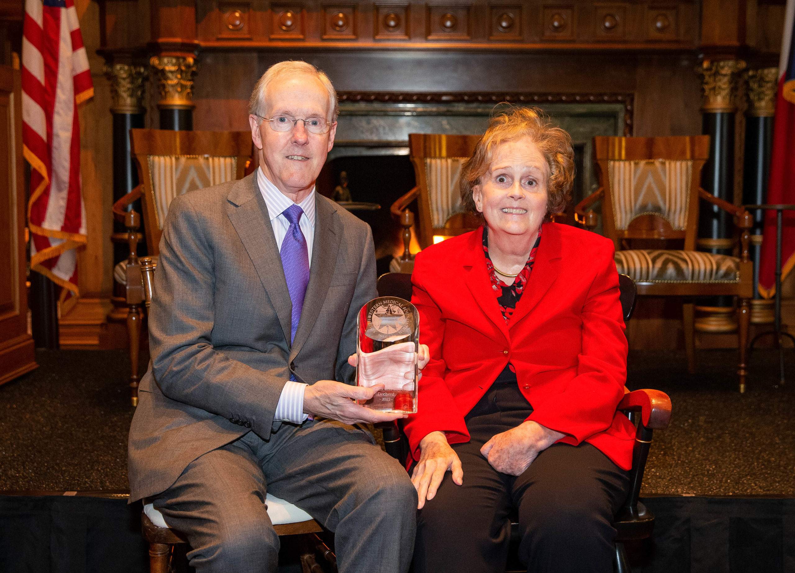 Robert and Maureen Decherd holding their Sprague award at the awards ceremony.