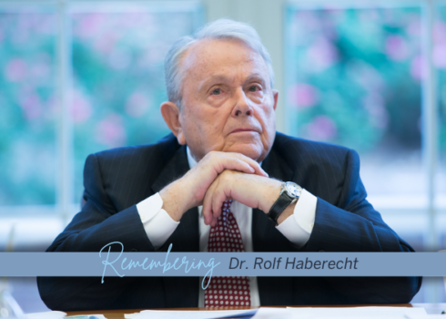 Photo of Dr. Rolf Haberecht sitting at a desk.
