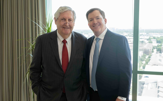 Dr. Kern Wildenthal and Southwestern Medical Foundation president and CEO, Michael McMahan pose for a picture.