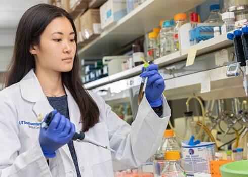 female researcher working on covid-19's viral disguise method