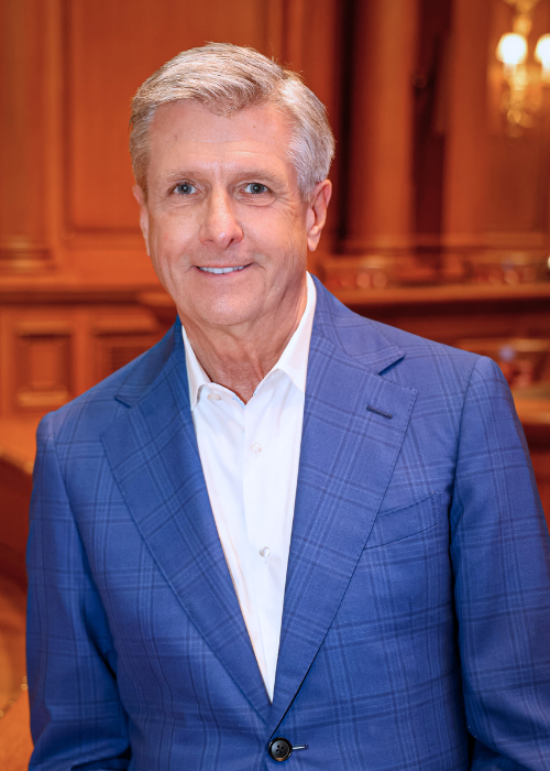 Dallas Mavericks CEO, Rick Welts, posing for a photo.